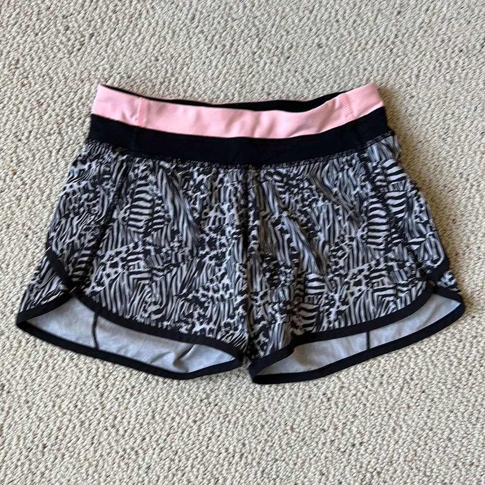 Ivivva by Lululemon speed ups black animal print. Girls size 10